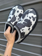 Cow print bruin slippers